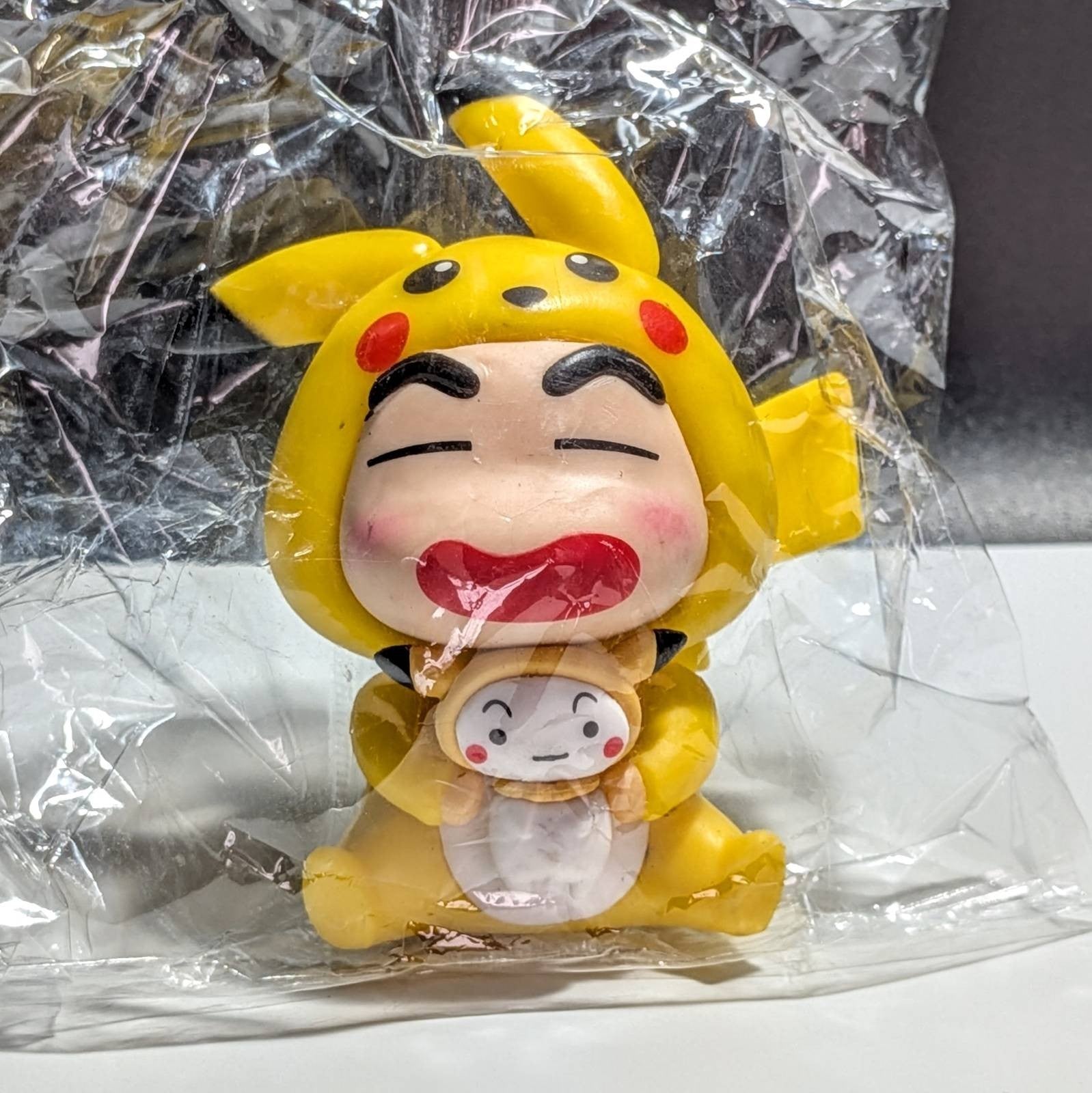 Shin Chan Pokemon Figure Pikachu Eevee Psyduck Squirtle Charmander Bulbasaur PVC