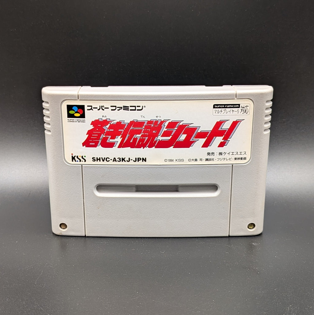 Aoki Densetsu Shoot video game cartridge for Nintendo's Super Famicom (SFC) Entertainment System, shown standing up and facing forward on a dark grey background.

