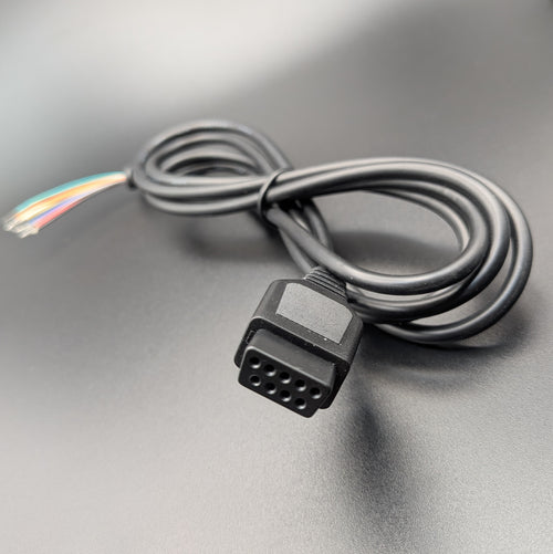 A black multi-pin connector cable with a 9 pin plug, shown on a dark gray background.