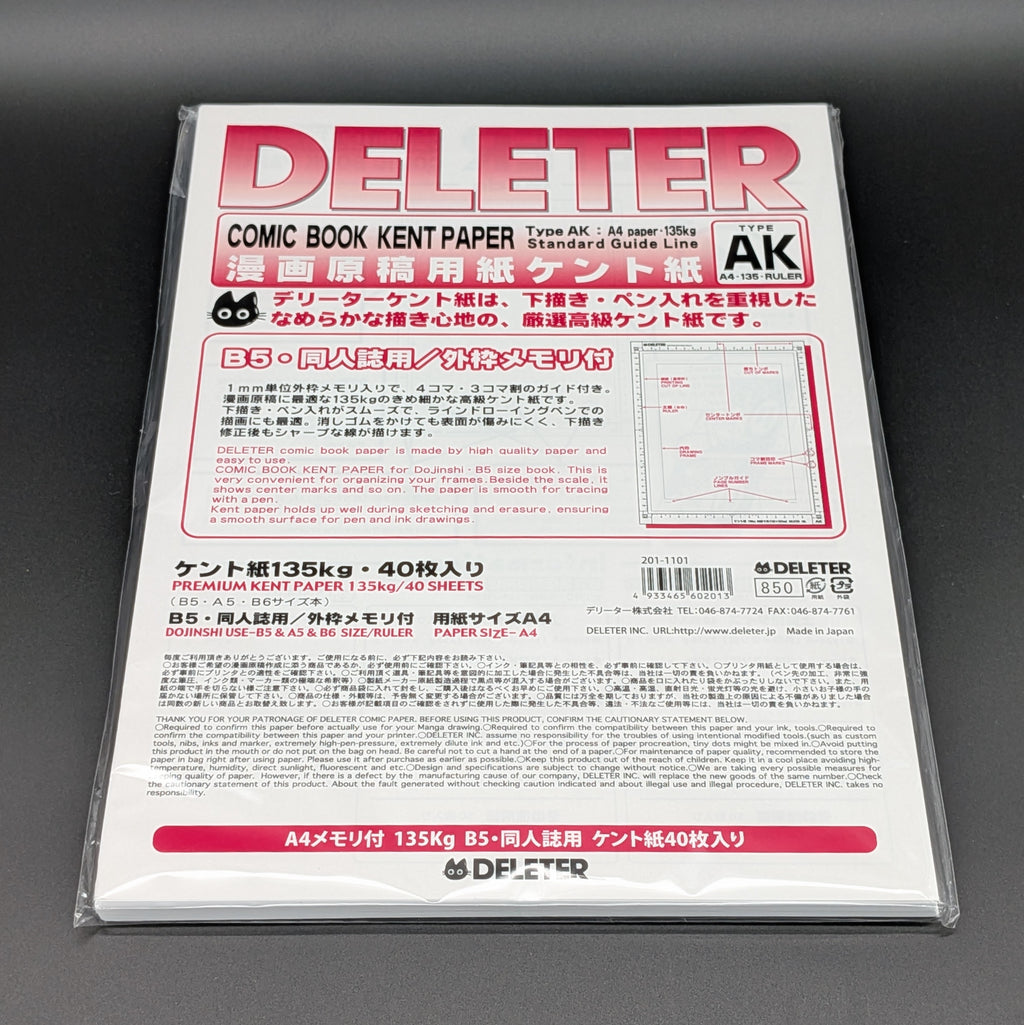A sealed package of Deliter Comic Book Kent Paper, Type AK, containing 40 sheets of 135g premium paper. The packaging is white with bold pink and black text, and is photographed on a grey background.