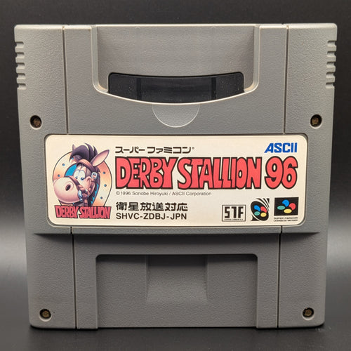 A close up of Derby Stallion 96' video game cartridge for Nintendo's Super Famicom (SFC) Entertainment System, shown standing up and facing forward on a dark grey background.

