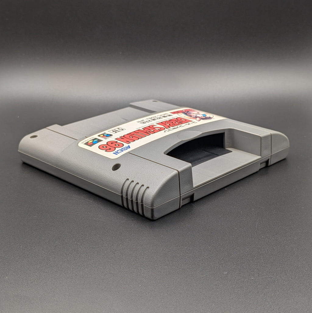 Derby Stallion 96 video game cartridge for Nintendo's Super Famicom (SFC) Entertainment System, shown laying on its back with the label facing upwards. Showing the right hand side and top section. It sits on a dark grey background.