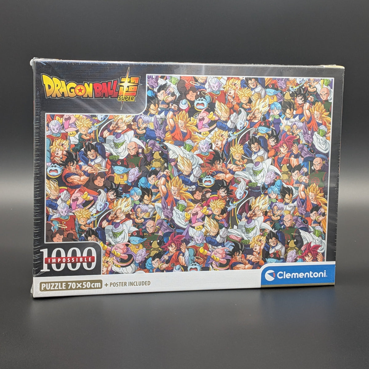 Dragon Ball Super 1000-piece jigsaw puzzle box by Clementoni, featuring a colourful collage of anime characters on a dark grey background.