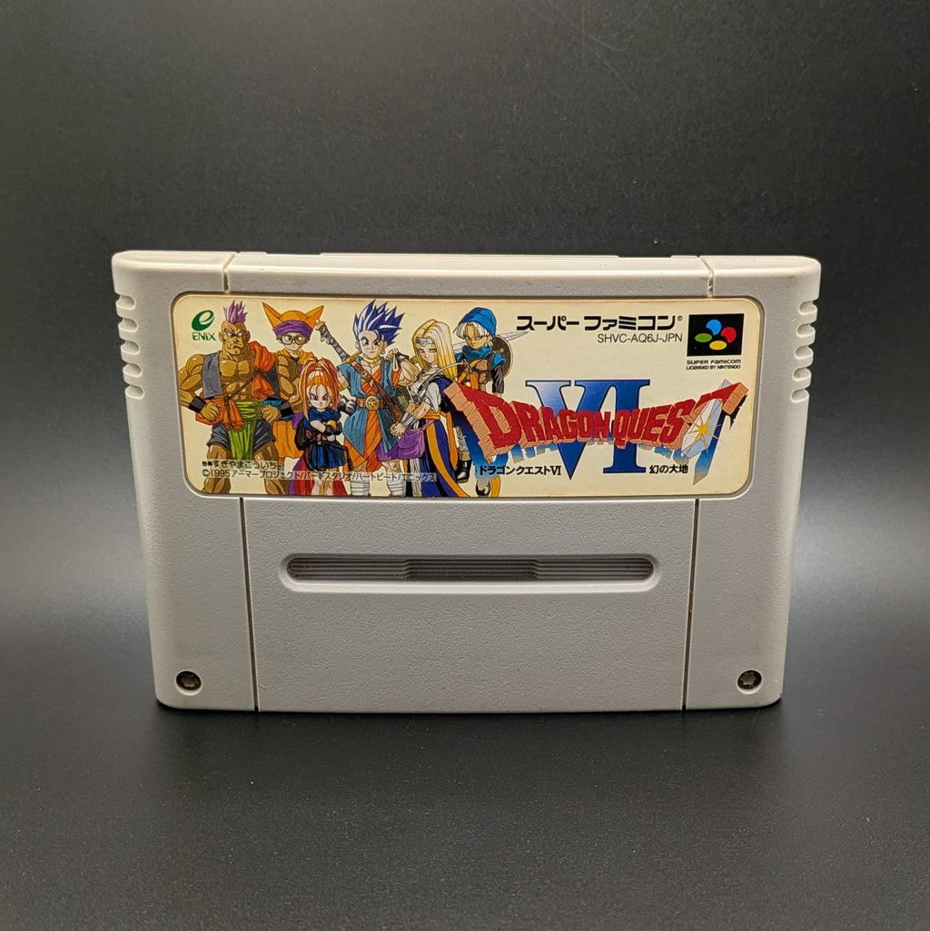 Dragon Quest 6 video game cartridge for Nintendo's Super Famicom (SFC) Entertainment System, shown standing up and facing forward on a dark grey background.