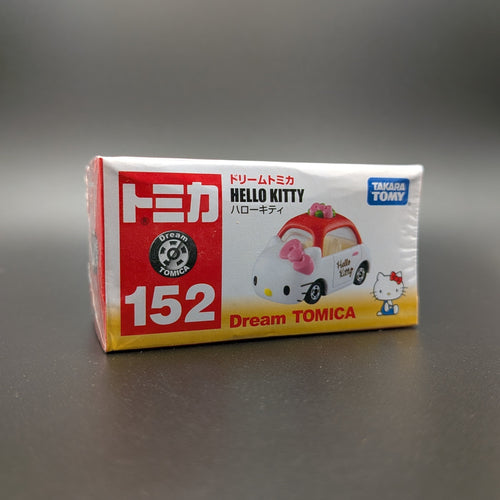 Dream TOMICA Hello Kitty toy car packaging on a gray background