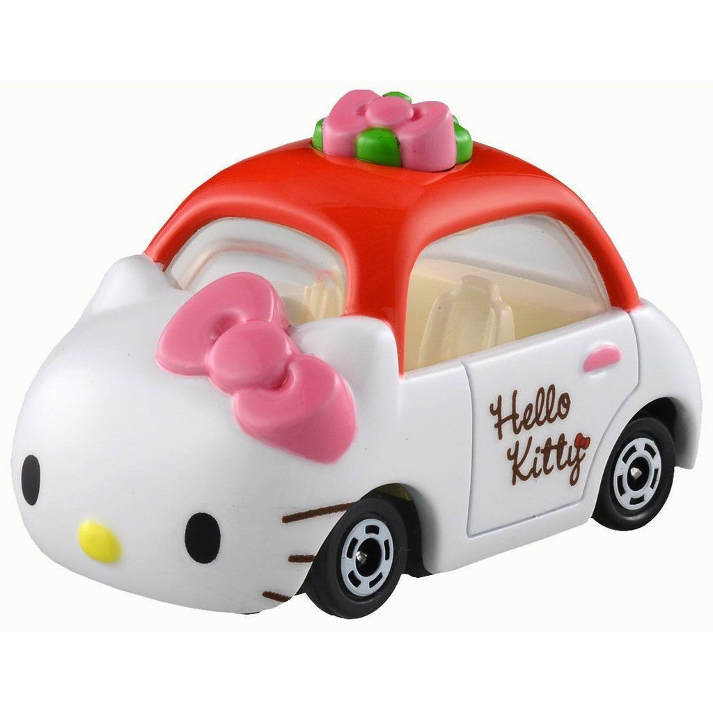 Hello Kitty toy car with red roof and pink bow on a white background