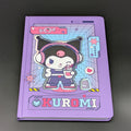 A purple Kuromi ruled notebook with a colourful cartoon cover illustration, photographed on a dark gray background. From the Sanrio POP range, printed by Blue Sky Studios.