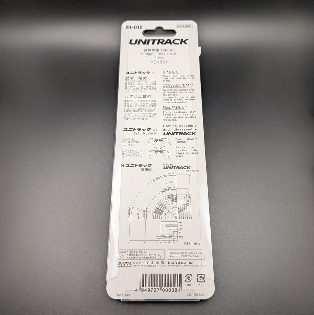Kato Unitrack 20-010 S186 — Straight Track, N-gauge (Pack of 4). The image shows the back of the packaging which shows additional information in both Japanese and English. Displayed on a black background.