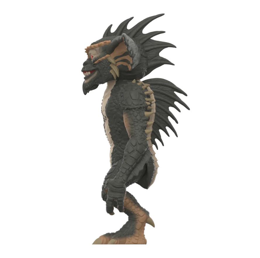 A detailed collectible figurine of a fantasy creature resembling a goblin or monster, standing in profile against a solid white background.