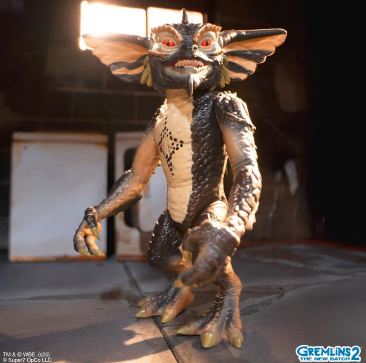 Gremlin action figure from Gremlins 2 with a dark background