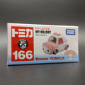 TOMICA Dream Melody My Melody number 166 toy car in its original Japanese packaging, featuring a pink and white car illustration on a white, red, and blue box.