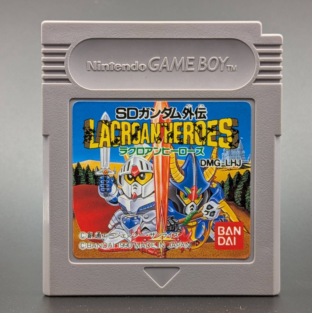A classic Nintendo Game Boy game cartridge for 'SD Gundam Lacroan Heroes' (DMG-LHU) by Bandai, featuring a gray plastic case with a colorful anime illustration on the front label.
