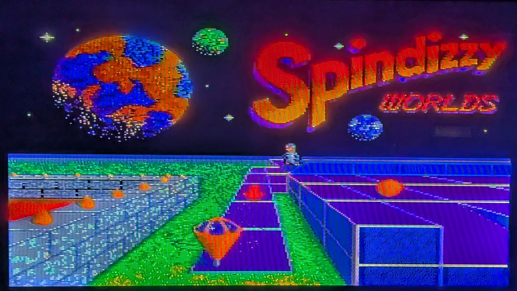 A game title screen game screen for  'Spindizzy Worlds' for  Nintendo's Super Famicom (SFC), with colorful planets, a small character & a spinning top, on a neon purple path way.
