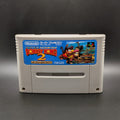 Donkey Kong 2 video game cartridge for Nintendo's Super Famicom (SFC) Entertainment System, shown standing up and facing forward on a dark grey background.
