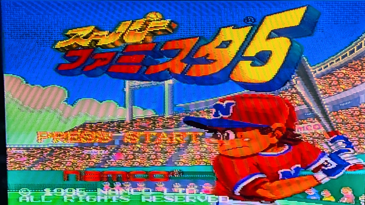 The game title screen for Super Famista 5, for Nintendo's Super Famicom (SFC), featuring the Japanese title in large stylized text at the top, a stadium crowd in the background, and a cartoon player character in a red cap and red jersey holding a bat sits to the right. To the left is "PRESS START" and (c) 1995 NAMCO. This is to show the game is tested and working.