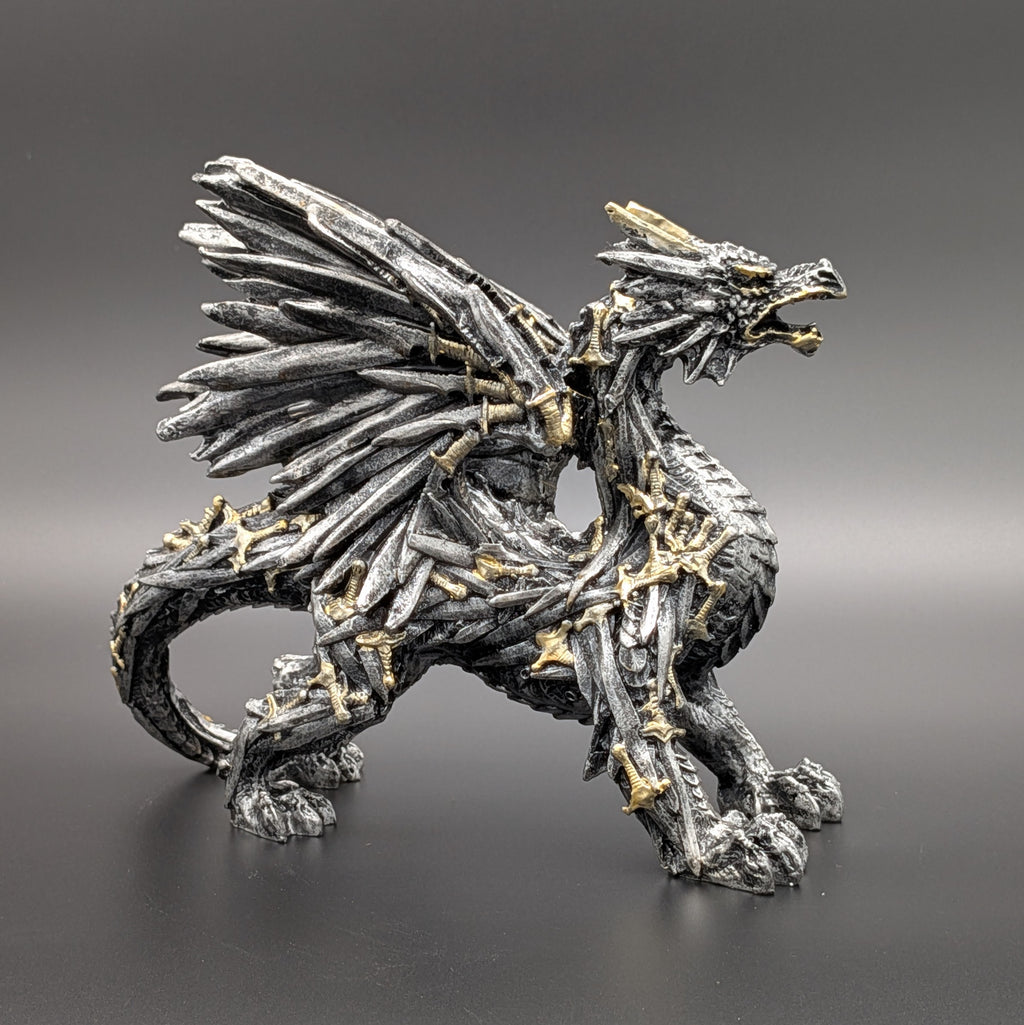 A detailed fantasy dragon figurine sculpted from metallic swords with gold accents, standing on a dark gray gradient background.