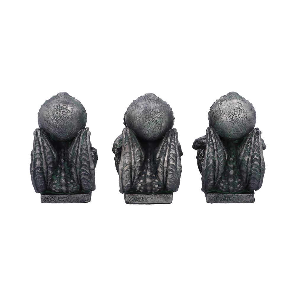 Three decorative Cthulhu figures, shown from the back, on a white background