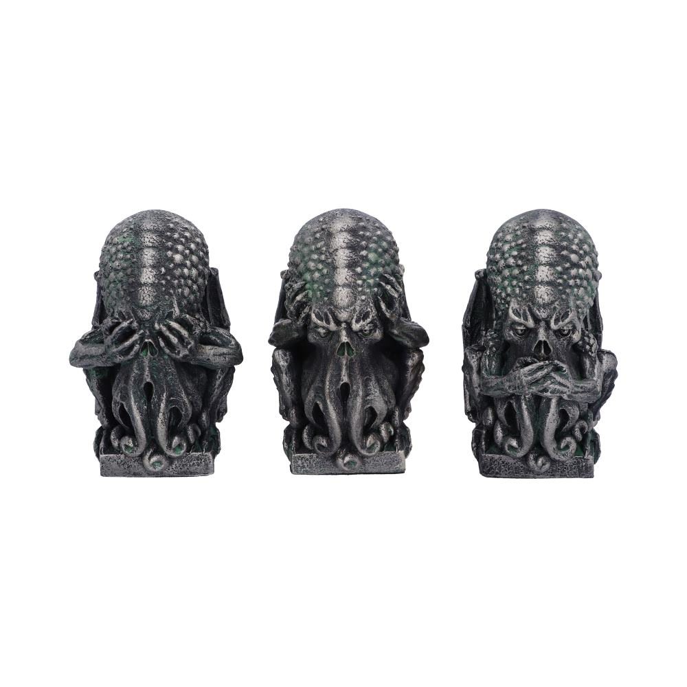 Three decorative Cthulhu figures on a white background