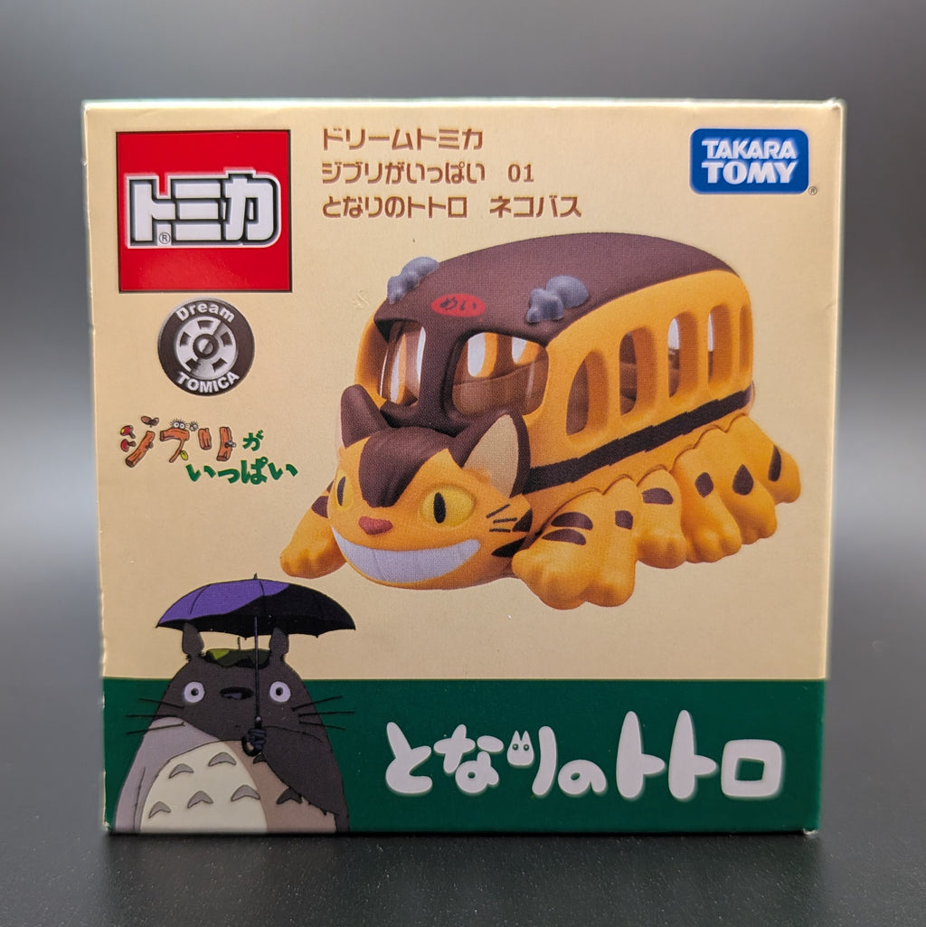 Tomica Dream Totoro Cat Bus collectible figure in its original packaging featuring Takara Tomy branding and Totoro artwork.