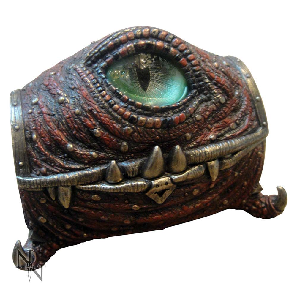 Decorative box designed like a mimic chest with metallic accents on a white background